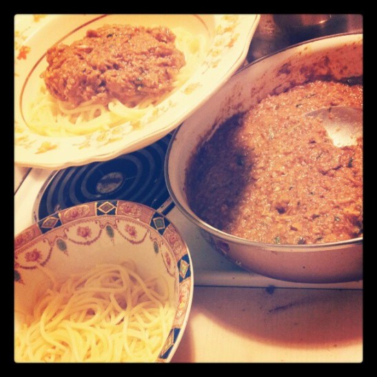 preparking orange duck ragu from duck roast left-overs